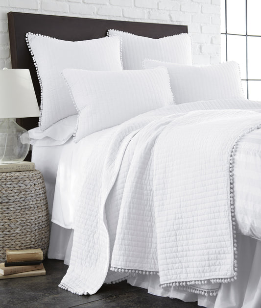 Clavo Pom Pom Coverlet Set.